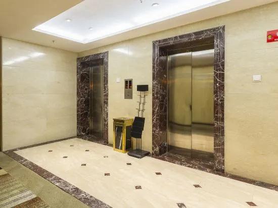 Xinniu Hotel - главное фото