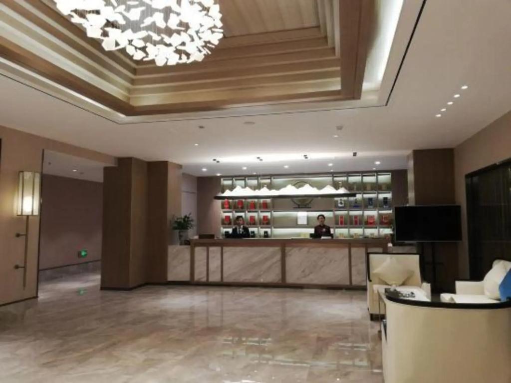 Xinzheng Xingangwanhua Hotel - главное фото