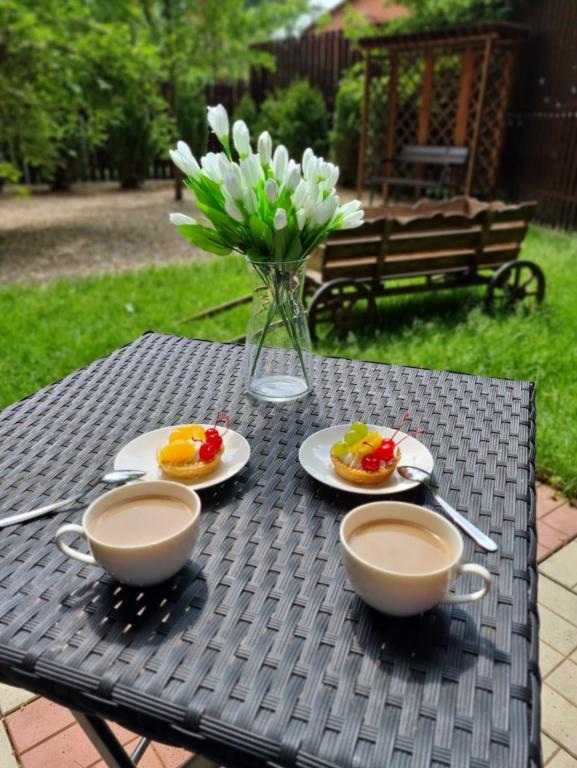 Частный дом Уютный дом с иллюминацией и зоной отдыха - главное фото