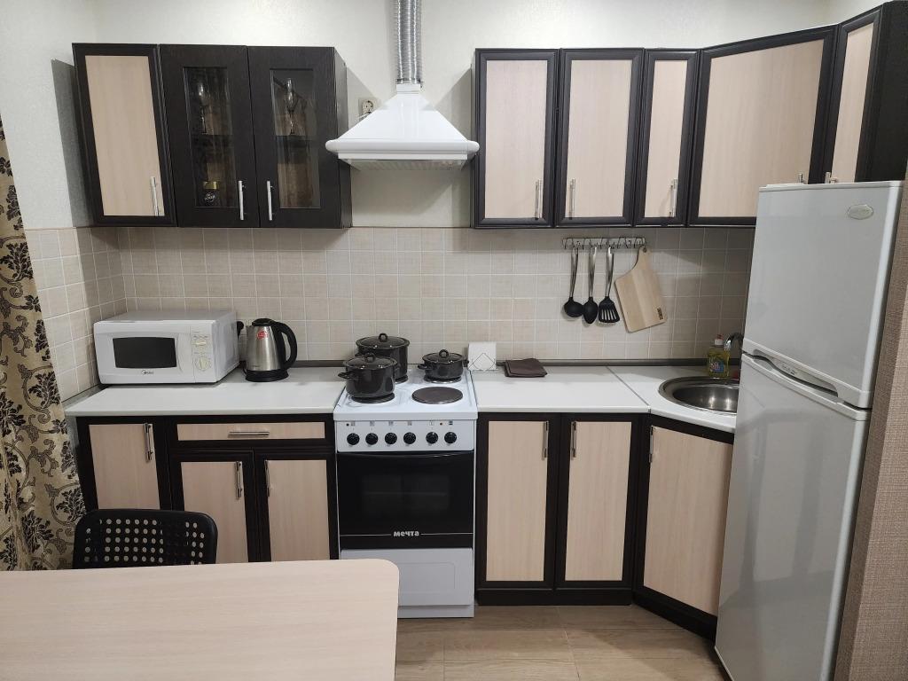 Апартаменты Студия Заря с Видом на Город Рядом с Вокзалом - главное фото