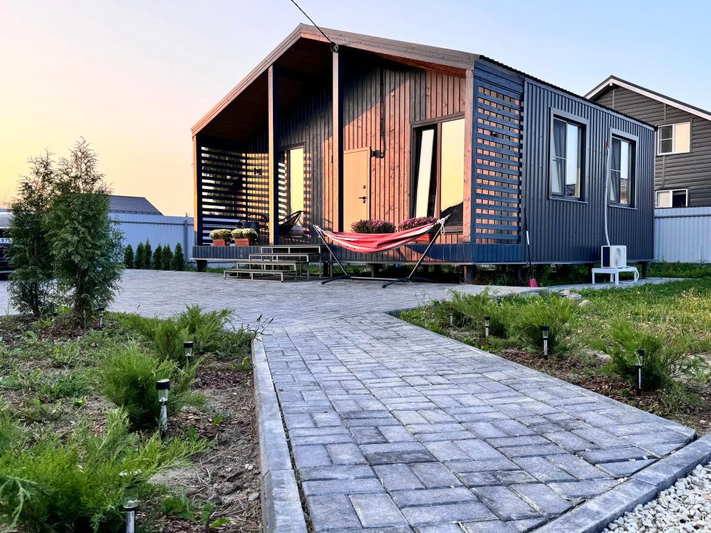 Частный дом Уютный дом в стиле барнхаус, с сауной, недалеко от реки - главное фото