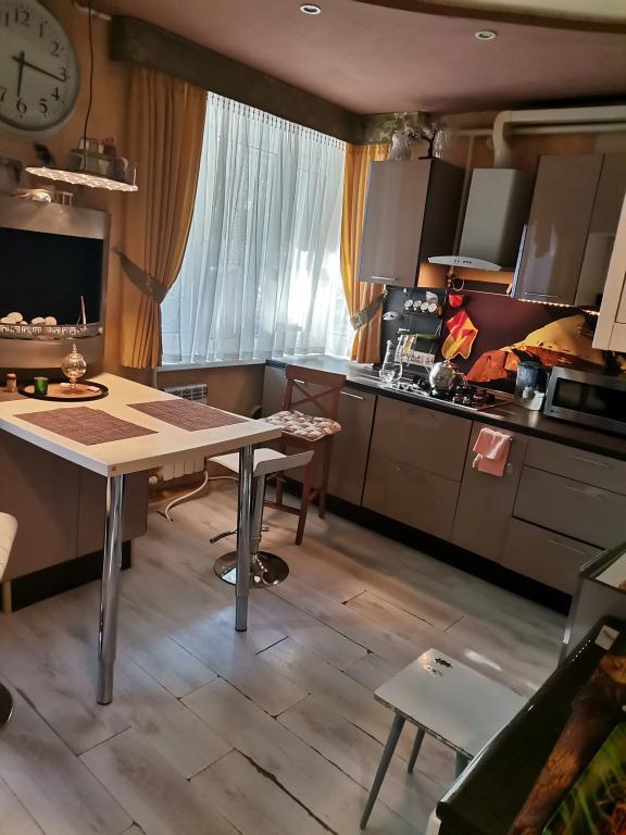 Апартаменты с камином в центре города - главное фото