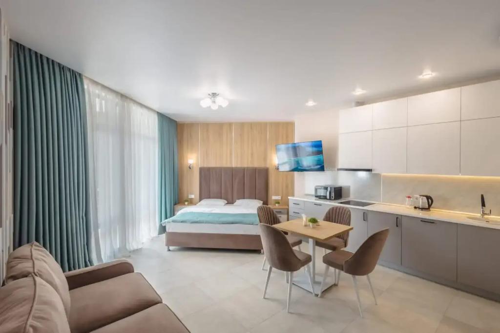 Квартира Студия от УК Family Pride Apartments 1 этаж кв.6 - главное фото