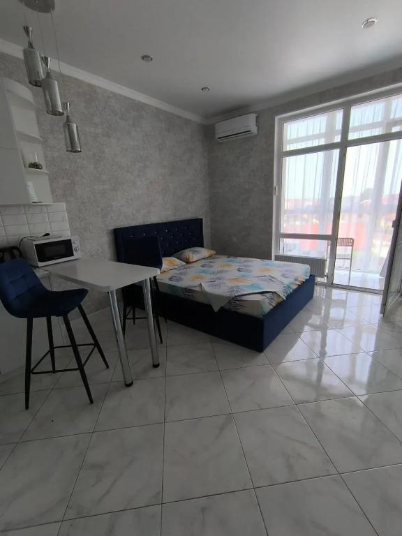 Квартира Уютная студия в районе Северного парка - главное фото